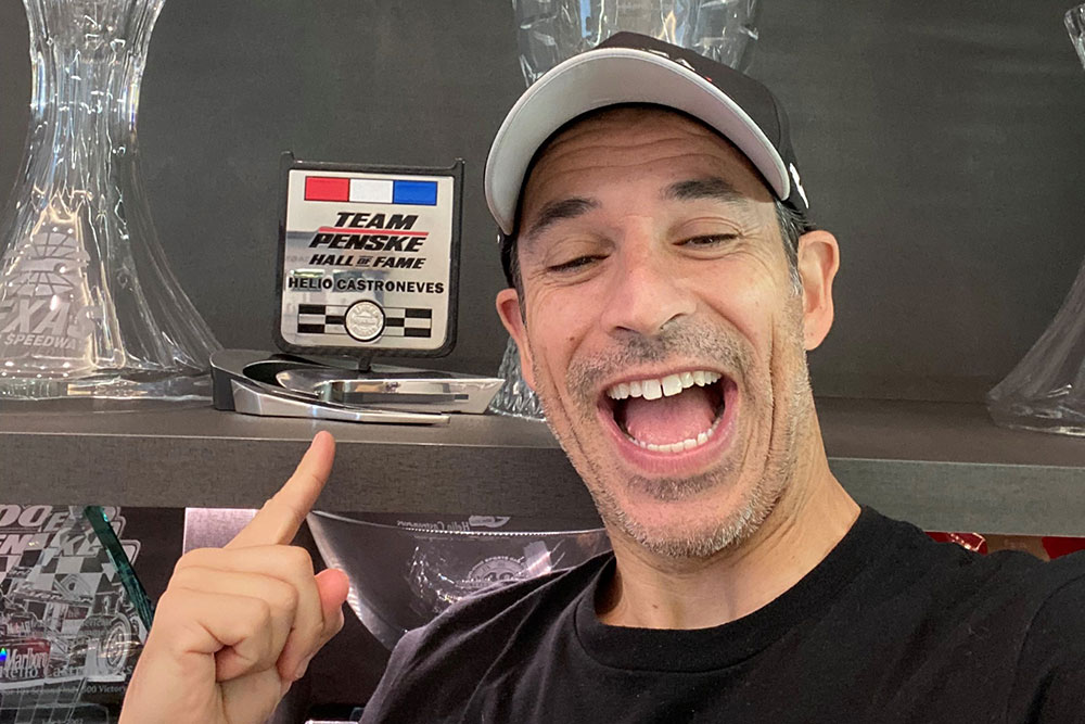 Helio Castroneves proudly displays his Team Penske Hall of Fame award at his home in Florida.