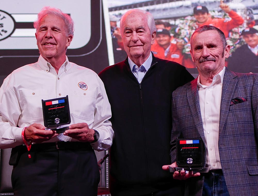 Longtime legal counsel Larry Bluth and former Team Penske GM Clive Howell at their Hall of Fame induction in 2022